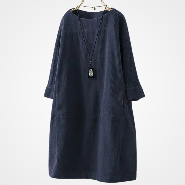 Elegant kvinnors vintageklänning. Perfekt som festklänning med rund hals, tidlös design.