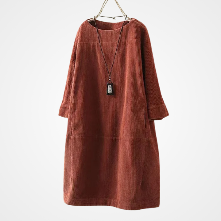 Vacker kvinnors vintageklänning. Rund hals och elegant snitt för en stilfull, tidlös look.