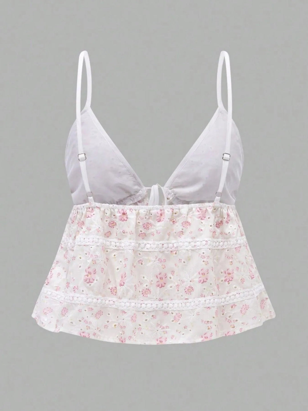 Casual vit blommig cami topp med knytning fram för kvinnor. Ärmlöst linne, perfekt för sommarsemester.