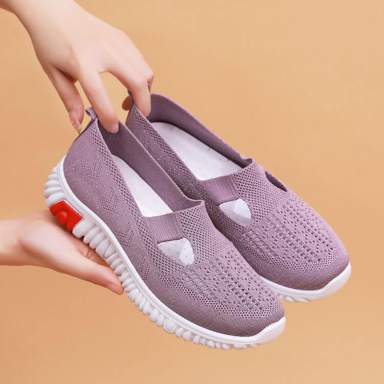 Grå damsneakers i slitstark canvas, lätta och med bra grepp för vardagsbruk.