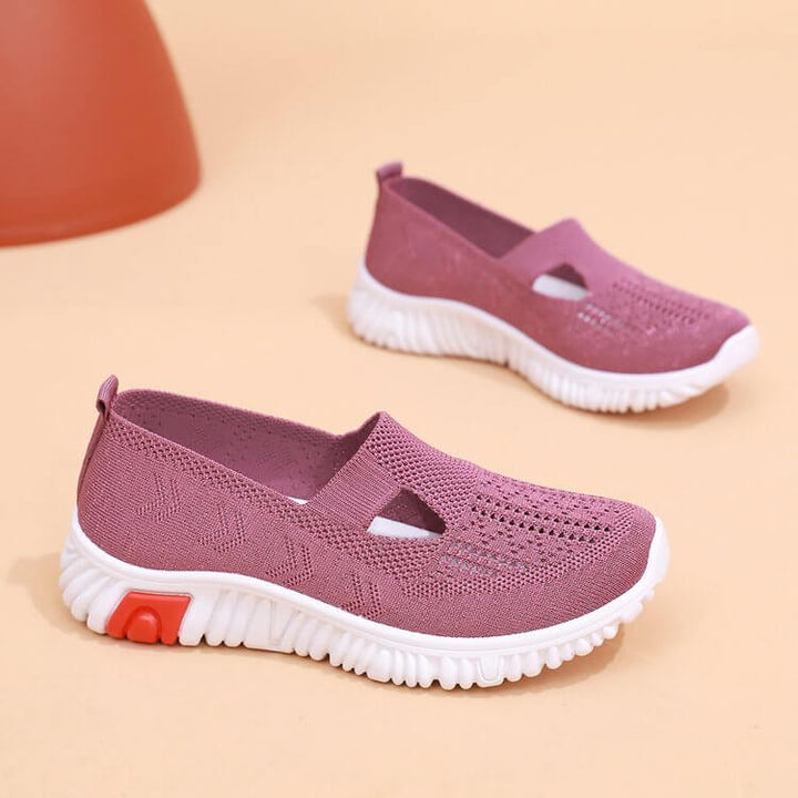Halkfria sulor på damsneakers i canvas, designade för komfort och säkerhet.