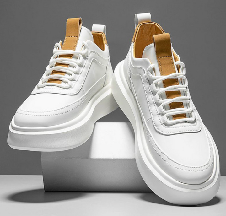 Brunvita herrskor, bekväma sneakers med mångsidig passform för en modern och stilfull vardag.